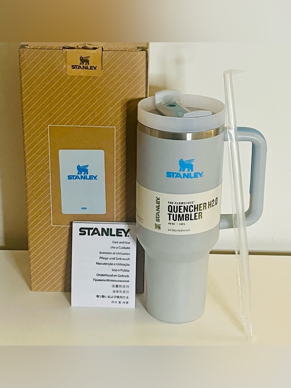Stanley 40oz Quencher Tumbler – Light Gray with Blue Logo & Handle Accent